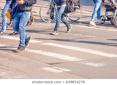 people-crossing-pedestrian-on-sunny-260nw-639814276